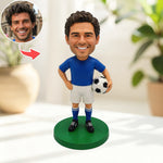 Figurine personnalisée de joueur de football tenant un ballon